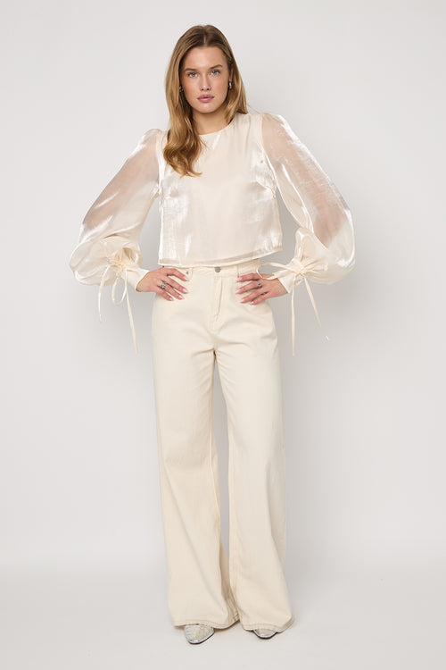 Blusa con perlas brillantes